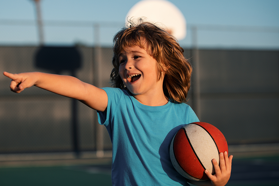 Happy-Kid-Playing-Kingston netball lessons for children